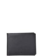 Image of <p>Portefeuille pour homme en cuir de vachette par <strong>Gsell</strong>.<br />Il s'organise avec <strong>8 emplacements</strong> pour carte bancaire dont une en vue transparente, une poche zippée pour la monnaie, une poche à billets, deux poches plates