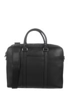 Image of <p>Serviette pour ordinateur portable 15" Le Tanneur en cuir grainé de la ligne Charles. <br />Elle possède une poche matelassée à l'intérieur pour votre PC et une pour votre tablette type Ipad (Taille compartiment PC : L 36 x H 26 x E 04 cm).<br /> La fi