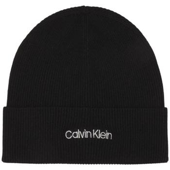 Image of Echarpe Tommy Hilfiger Bonnet Calvin Klein femme Ref 57532 BAX Noir