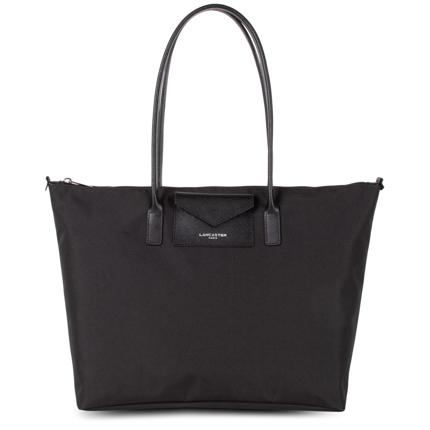 Image of <div data-content-type="html" data-appearance="default" data-element="main"><p>Grand sac shopping, en toile, agrémenté d'une poche avant à rabat en forme d'enveloppe (format CB) et de poignées grain saffian. <br />Une poche zip