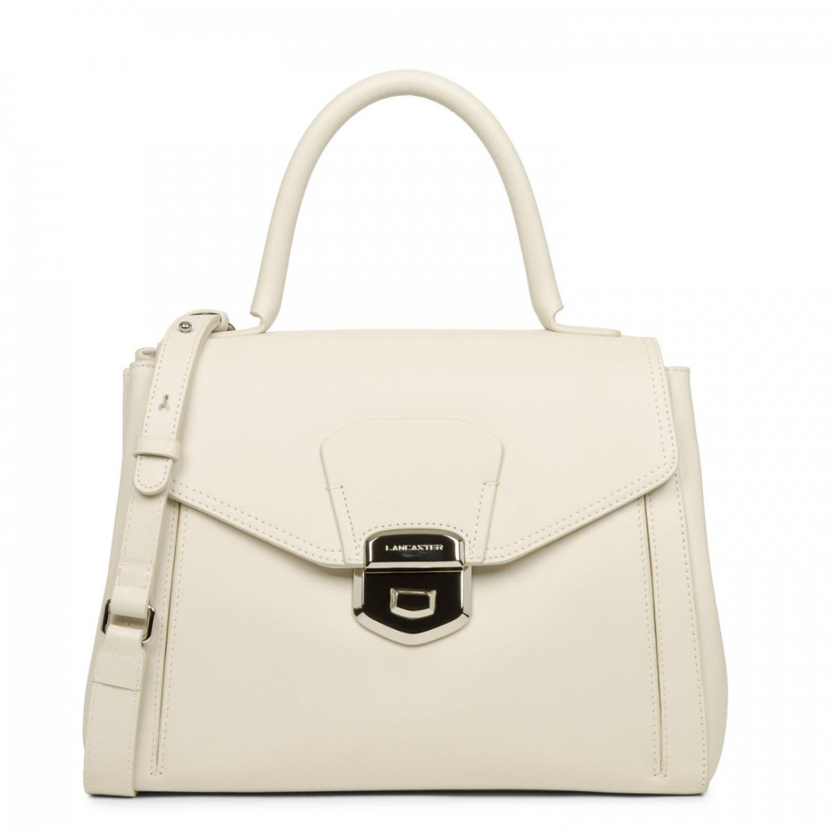Image of <p>Grand et élégant sac cabas Sophia doté d'un rabat à fermoir métallique et d'une belle finition en cuir pleine fleur. <br />Entièrement doublé, il offre deux compartiment séparés par une poche zippée. <br />Trois poches intérieures dont une zippée et un
