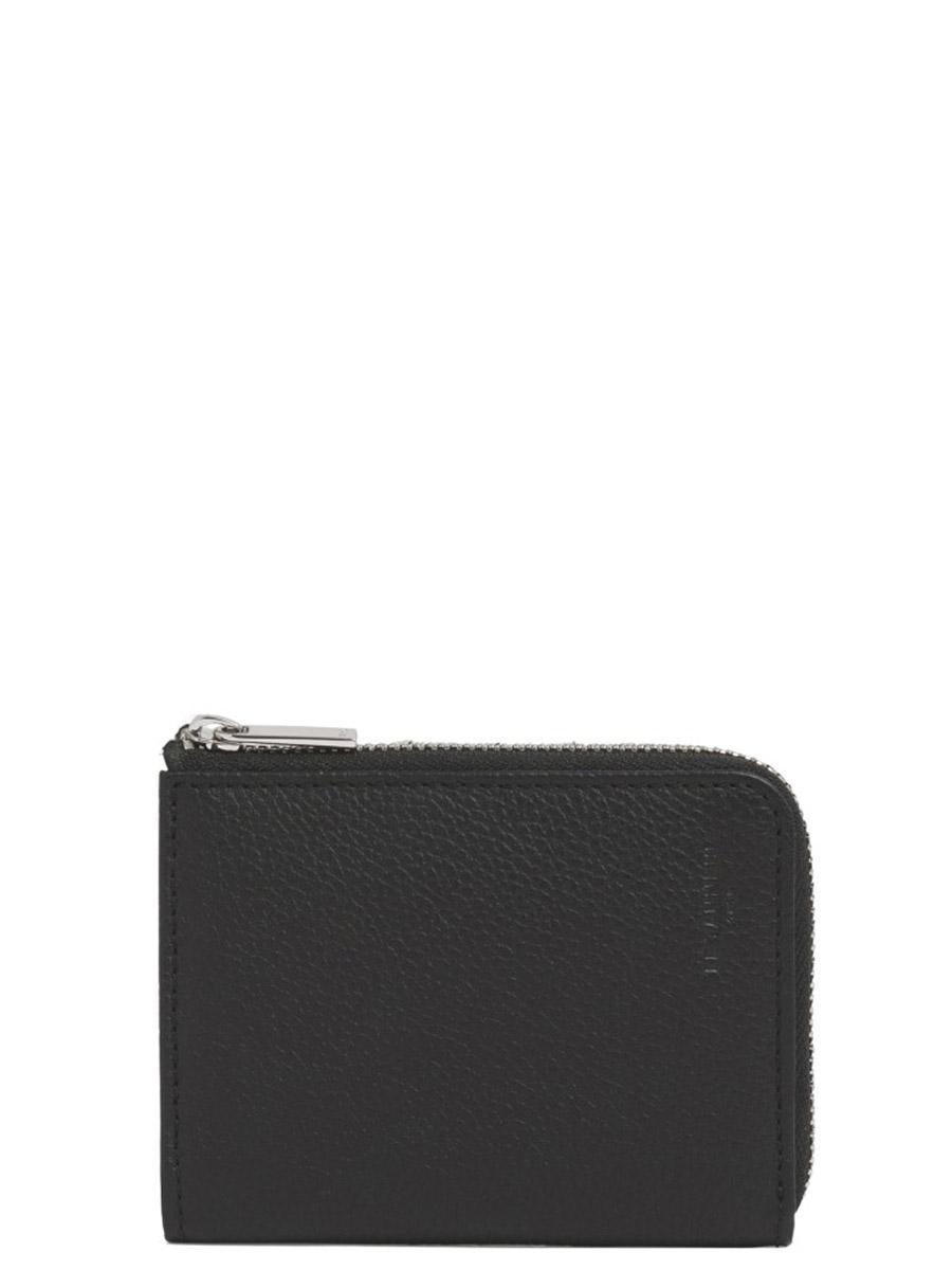 Image of <p>Porte-monnaie zippé Charles de chez Le Tanneur est un modèle intemporel fabriqué en cuir de vachette pleine fleur. <br />D'une grande qualité, il conservera son élégance au fil des années. <br />Ses dimensions permettent d?accueillir 2 cartes bancaires