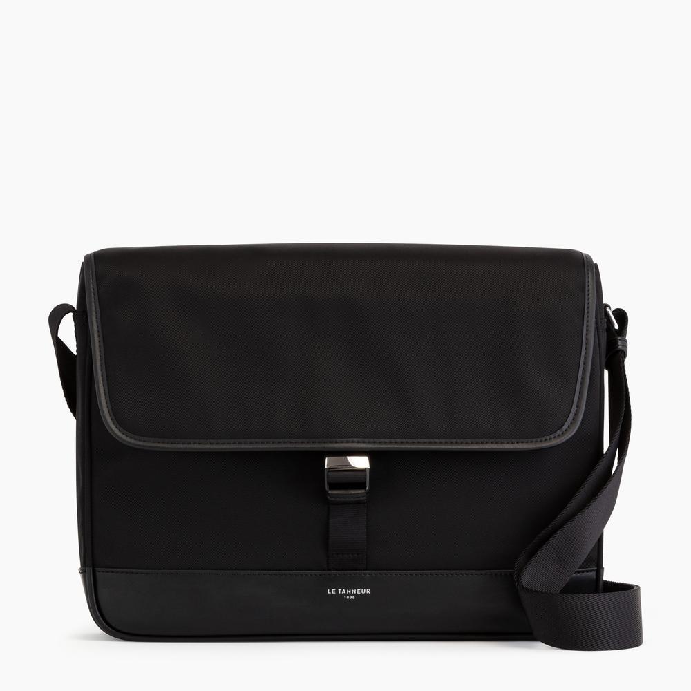 Image of <p>Sac besace Gaspard Le Tanneur pour PC 15" avec renfort de cuir lisse. <br />Il pourra être porté à l'épaule ou croisé avec sa bandoulière ajustable. <br />L'intérieur doublé de toile bleue contient une poche renforcée pour y ranger un ordinateur 15" (3